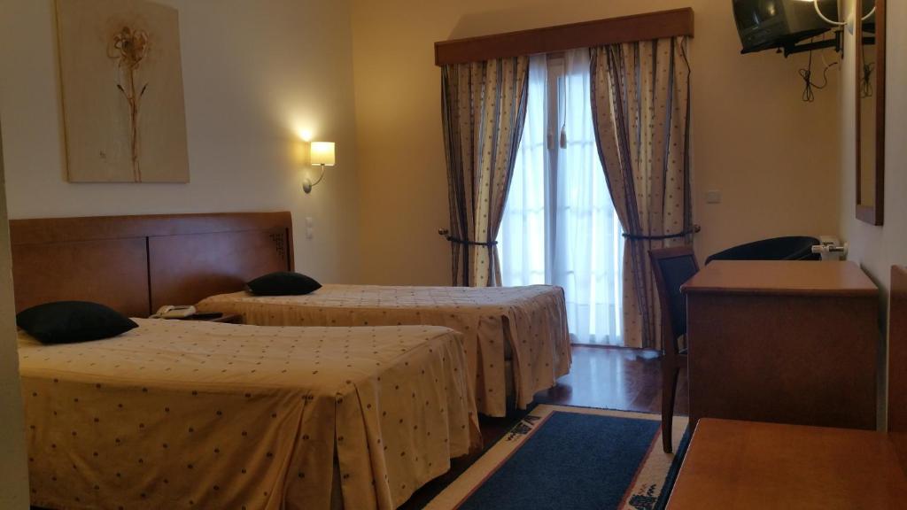 Трехместный (Трехместный номер с основными удобствами) отеля Hotel O Colmo, Сантана