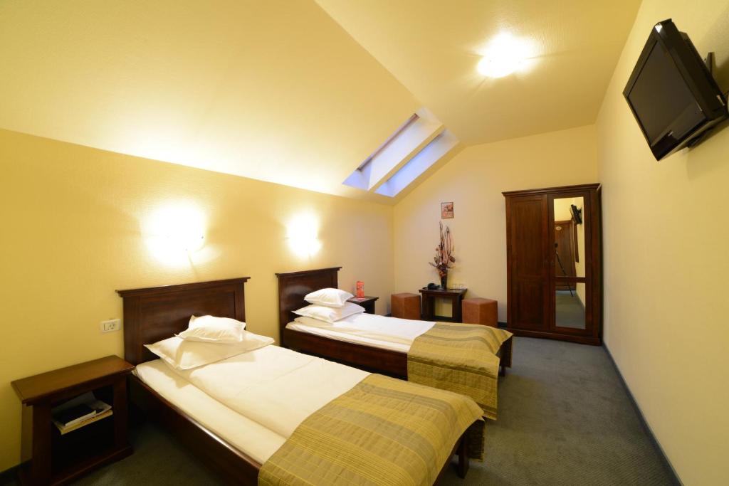 Двухместный (Двухместный номер с 2 отдельными кроватями) отеля Hotel Lucy Star, Клуж-Напока