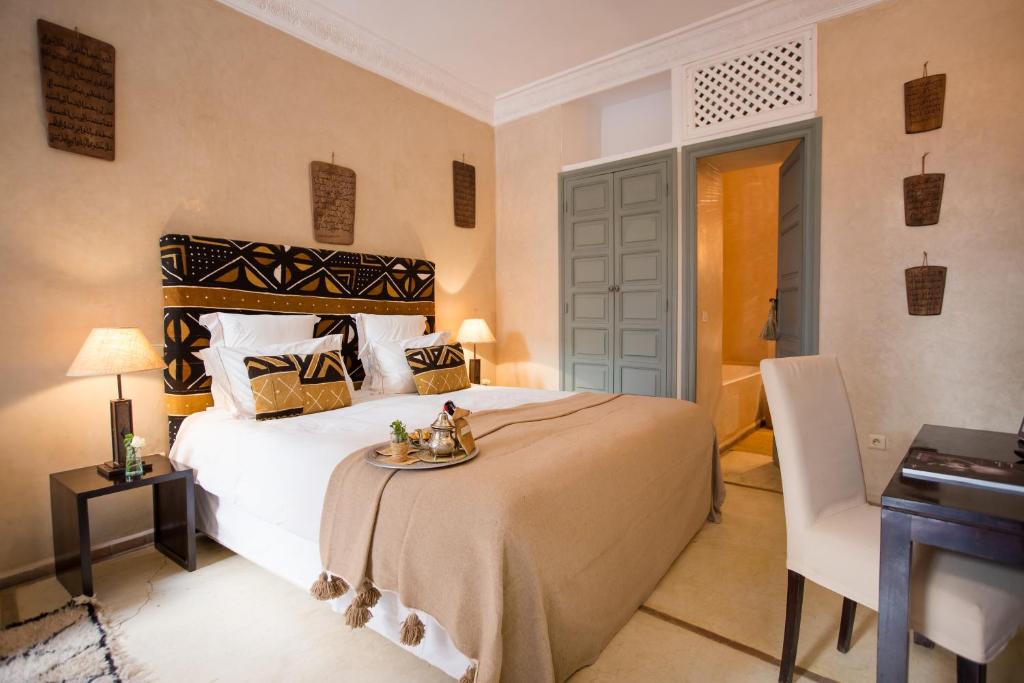 Двухместный (Улучшенный двухместный номер Orchidee с 1 кроватью или 2 отдельными кроватями - Со стороны Роми) отеля Riad Olema et Spa, Марракеш