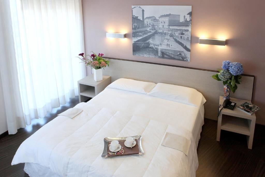 Двухместный (Двухместный номер с 1 кроватью или 2 отдельными кроватями) отеля Hotel Mennini, Милан