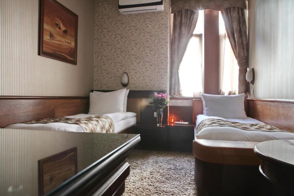 Двухместный (Стандартный двухместный номер с 2 отдельными кроватями) гостевого дома Vila Terazije, Белград