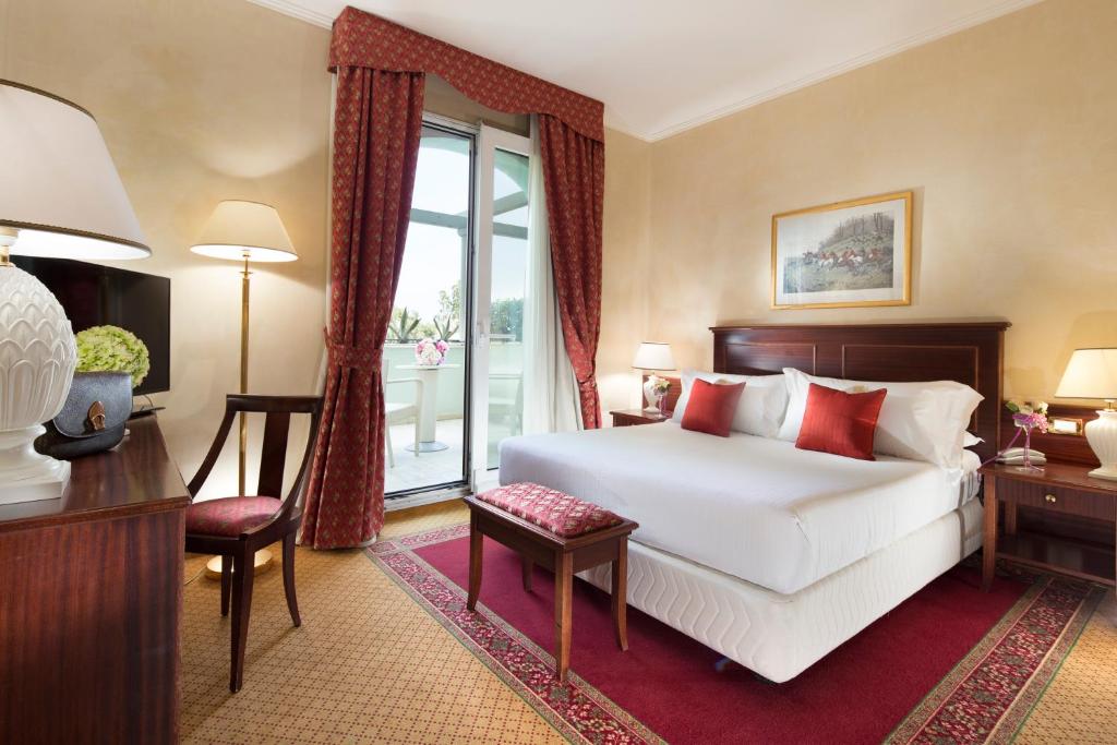 Двухместный (Представительский двухместный номер с 1 кроватью или 2 отдельными кроватями и правом посещения спа-салона) отеля Hotel De Londres, Римини