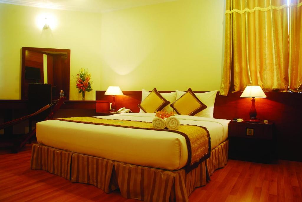 Двухместный (Улучшенный двухместный номер с 1 кроватью или 2 отдельными кроватями) отеля Hau Giang Hotel, Кантхо