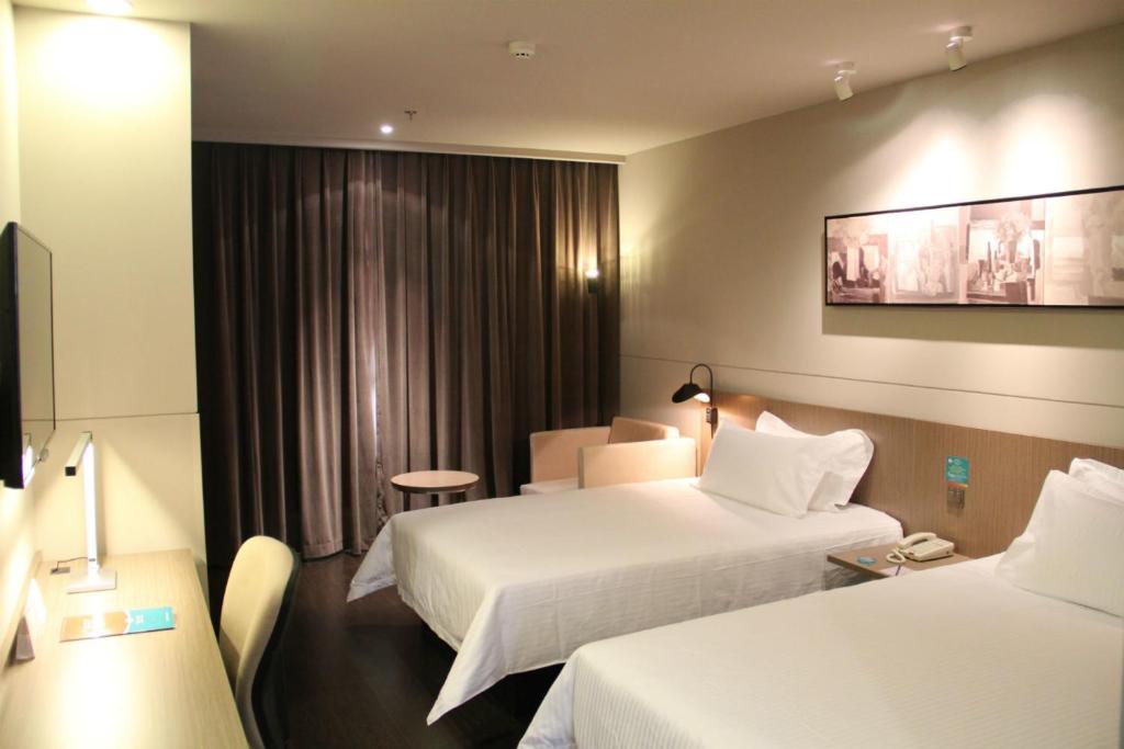 Двухместный (Двухместный номер А бизнес-класса с 2 отдельными кроватями) отеля Jinjiang Inn Shenyang Zhongshan Park, Шэньян