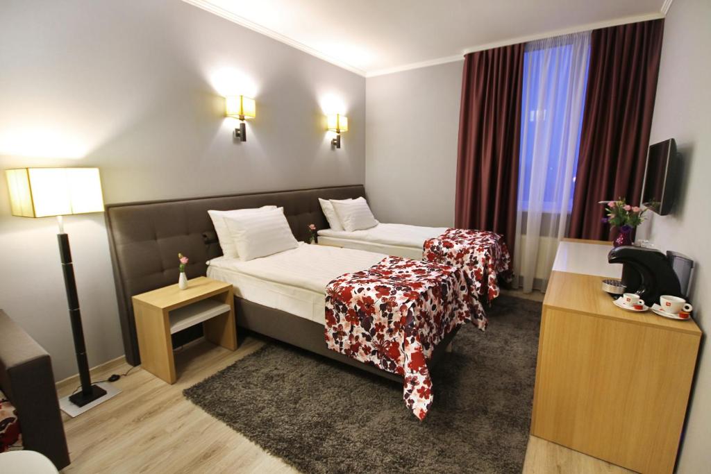 Двухместный (Двухместный номер Делюкс с 2 отдельными кроватями) отеля City Park, Кишинев