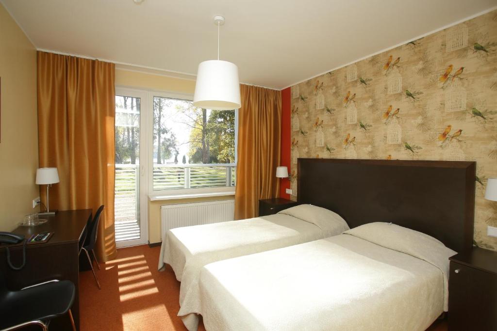 Двухместный (Двухместный номер с 1 кроватью или 2 отдельными кроватями, доступ к бассейну) отеля Pühajärve Spa & Holiday Resort, Отепя