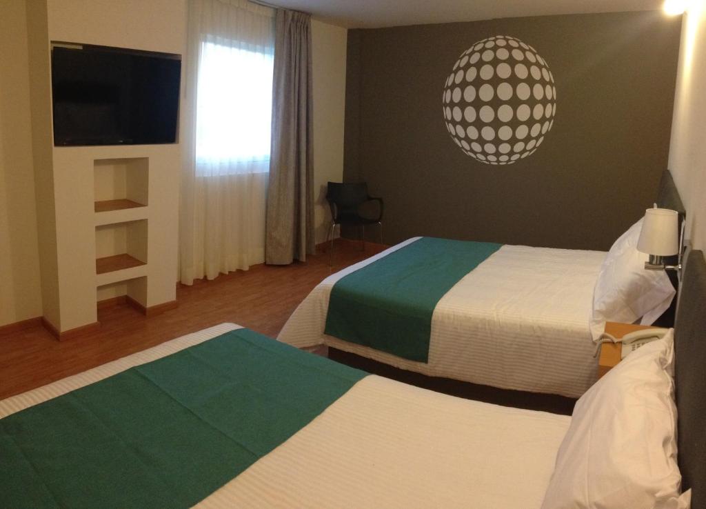 Двухместный (Двухместный номер с 2 отдельными кроватями) отеля Hotel Dajana Boulevard, Леон (Штат Гуанахуато)