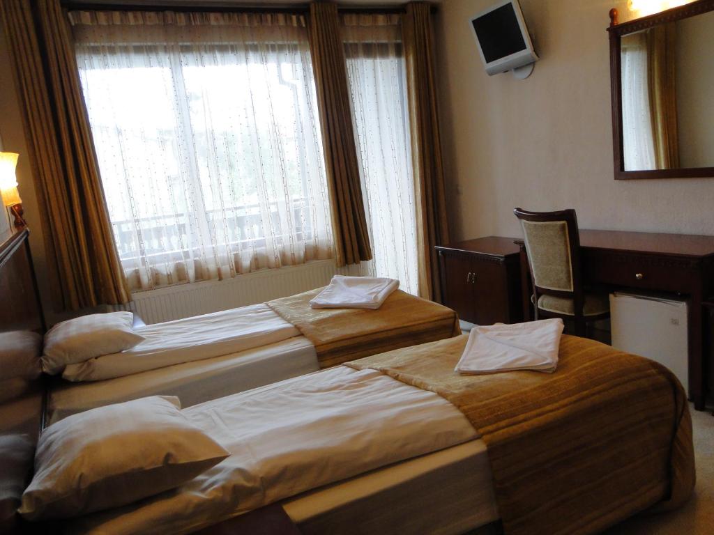 Двухместный (Двухместный номер с 1 кроватью или 2 отдельными кроватями) гостевого дома Guest House Chicho Tsane, Банско