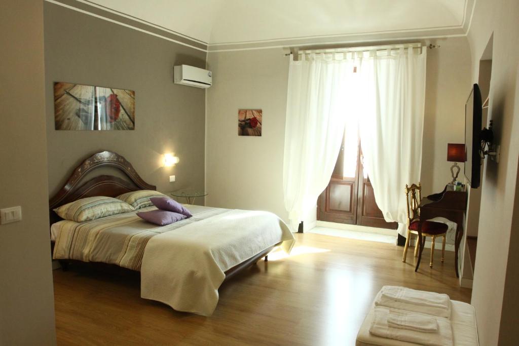 Двухместный (Улучшенный номер с кроватью размера «queen-size») отеля B&B Suite Cutelli, Катания