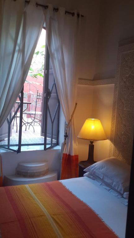 Двухместный (Стандартный двухместный номер с 1 кроватью террасой) отеля Riad Les Jardins d'Henia, Марракеш