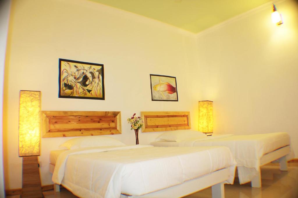 Двухместный (Двухместный номер с 1 кроватью или 2 отдельными кроватями) гостевого дома Kaafu Inn Guraidhoo, Гурайдо