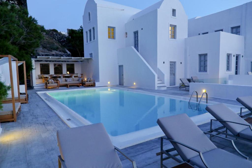 Вилла (Президентская вилла с 7 спальнями и собственным бассейном.) отеля Ambassador Santorini Luxury Villas & Suites, Акротирион