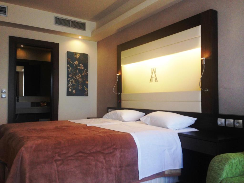 Двухместный (Бюджетный двухместный номер с 2 отдельными кроватями) отеля Arion Hotel, Ксилокастро