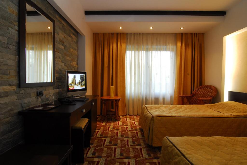 Двухместный (Двухместный номер с 1 кроватью или 2 отдельными кроватями) гостевого дома Pensiunea Casa Iris, Синая