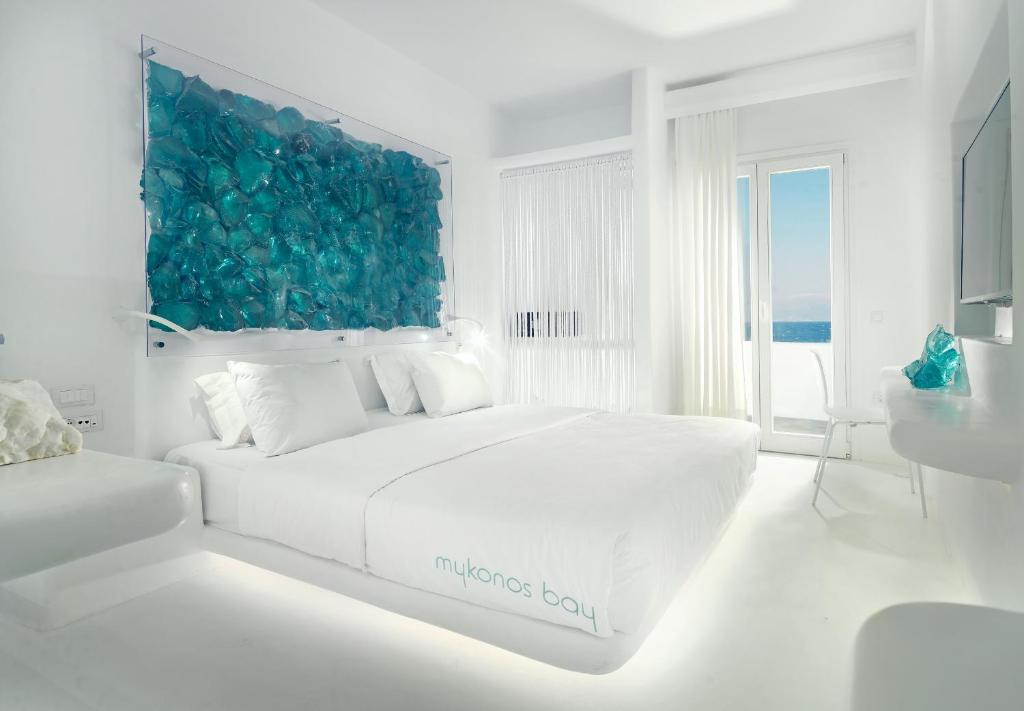 Трехместный (Двухместный номер Делюкс с 1 кроватью и видом на море) отеля Mykonos Bay Hotel, Миконос