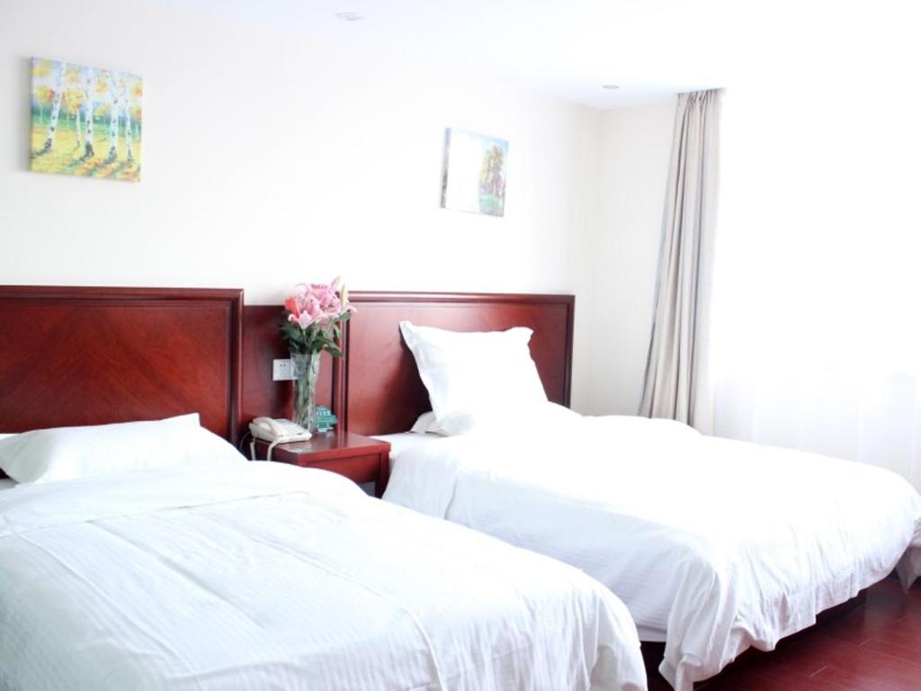 Двухместный (Двухместный номер бизнес-класса с 2 отдельными кроватями) отеля GreenTree Inn YanTai, Яньтай