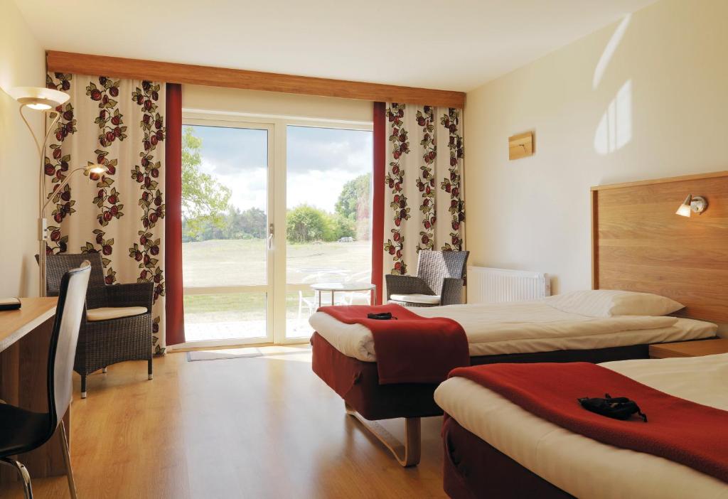 Двухместный (Стандартный двухместный номер с 2 отдельными кроватями) отеля Araslöv Golf & Resort, Кристианстад