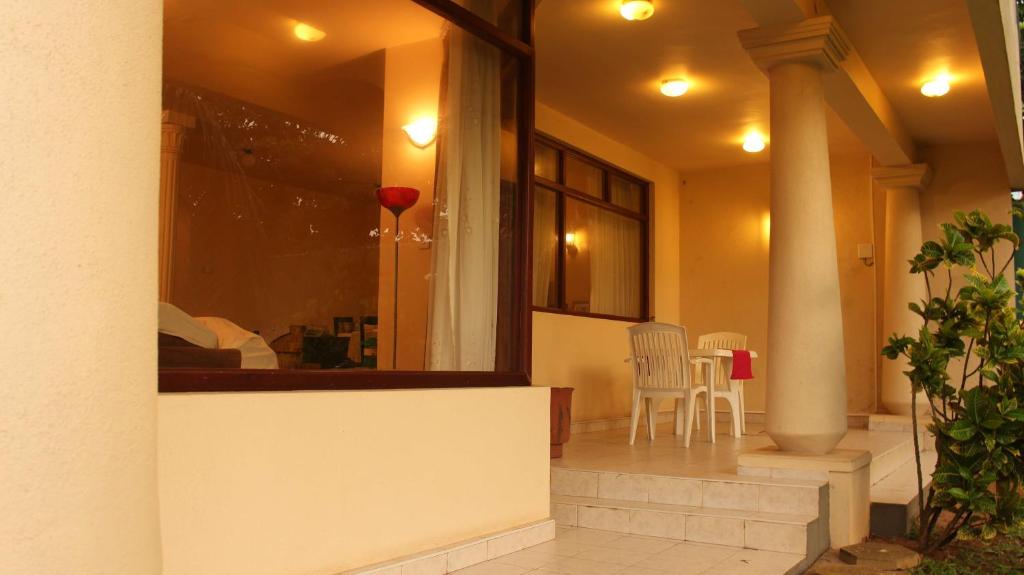 Двухместный (Стандартный двухместный номер с 1 кроватью или 2 отдельными кроватями) гостевого дома Janishi Residencies, Негомбо