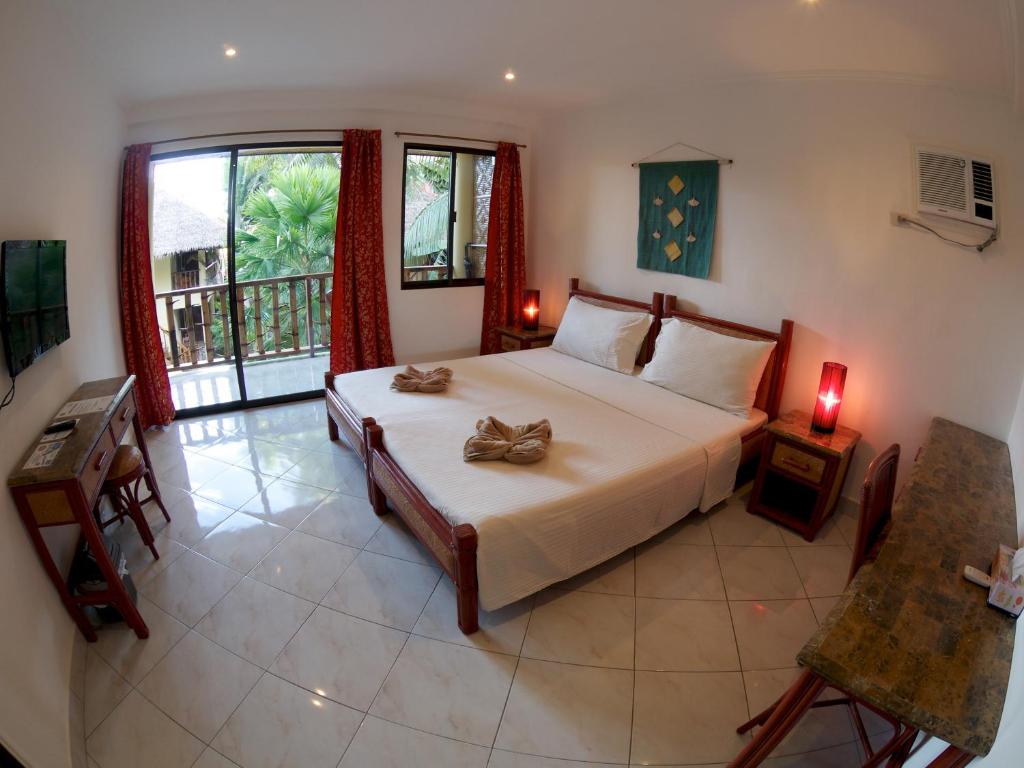 Двухместный (Улучшенный двухместный номер с 1 кроватью или 2 отдельными кроватями) курортного отеля Alona Vida Beach Resort, Панглао