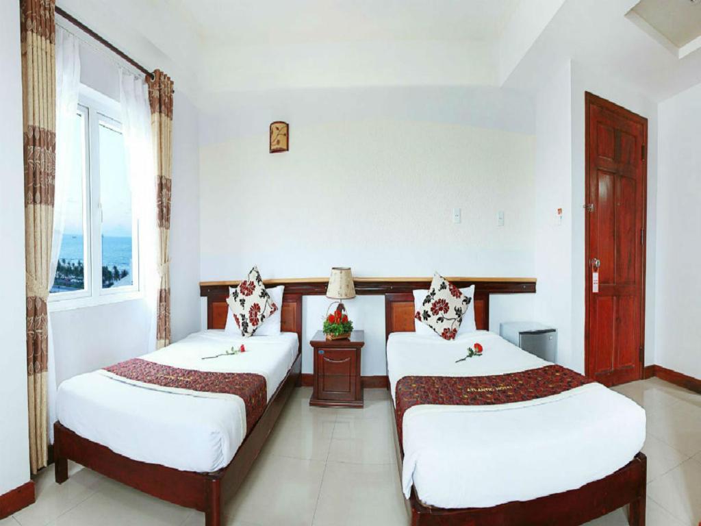Семейный (Семейный номер Делюкс) отеля Atlantic Hotel Danang, Дананг