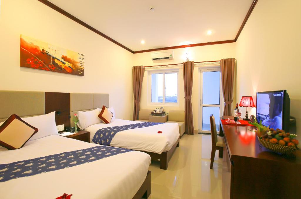 Двухместный (Двухместный номер Делюкс с 2 отдельными кроватями) отеля Ban Thach Riverside Hotel & Resort, Тамки