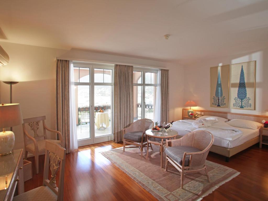 Двухместный (Двухместный номер Делюкс с 1 кроватью или 2 отдельными кроватями) отеля Villa Sassa Hotel, Residence & Spa, Лугано