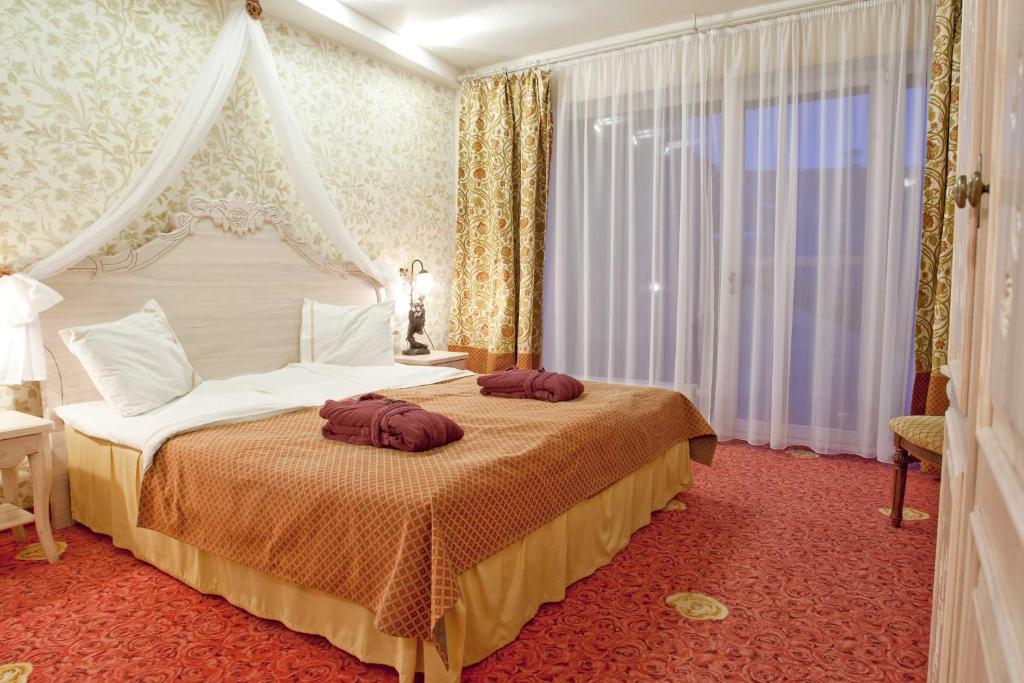Двухместный (Двухместный номер с 1 кроватью или 2 отдельными кроватями и возможностью посещения спа-салона) отеля Grand Rose SPA Hotel, Курессааре