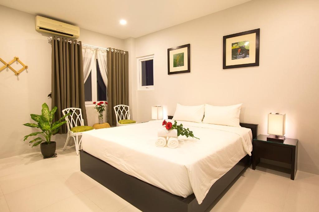 Двухместный (Двухместный номер Делюкс с 1 кроватью или 2 отдельными кроватями) отеля La Paloma Villa, Нячанг