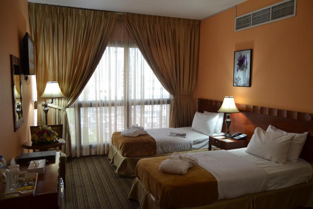 Двухместный (Стандартный двухместный номер с 2 отдельными кроватями - Для курящих) отеля Top Stars Hotel, Абу-Даби
