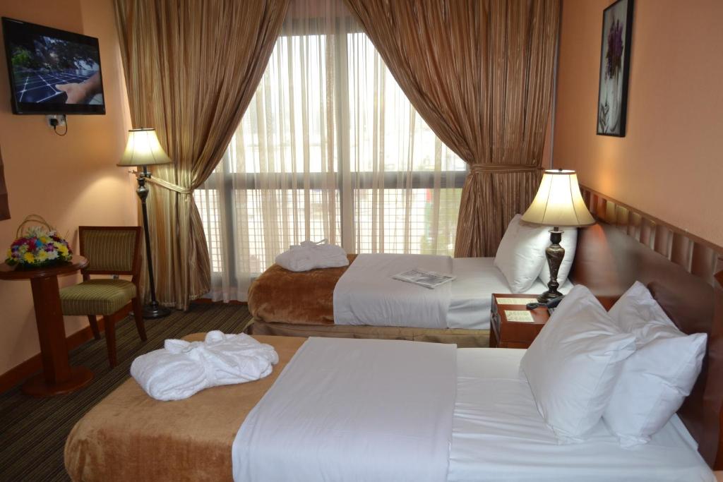 Двухместный (Стандартный двухместный номер с 2 отдельными кроватями — Для некурящих) отеля Top Stars Hotel, Абу-Даби