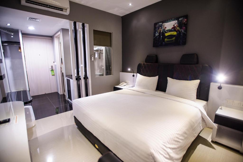 Двухместный (Стандартный двухместный номер с 1 кроватью или 2 отдельными кроватями) отеля Happy Inn, Джакарта
