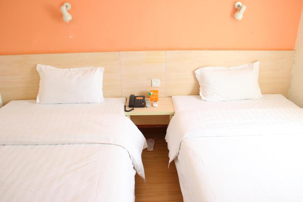 Двухместный (Стандартный двухместный номер с 2 отдельными кроватями) отеля 7Days Inn Qingdao Liuting Airport 2nd, Циндао