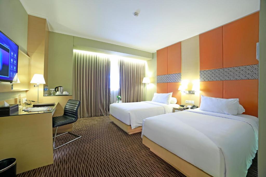 Двухместный (Улучшенный двухместный номер с 2 отдельными кроватями) отеля All Sedayu Hotel Kelapa Gading, Джакарта