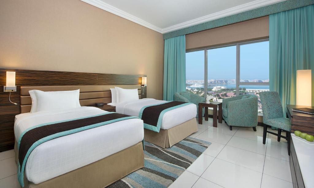 Двухместный (Стандартный двухместный номер с 2 отдельными кроватями) отеля Atana Hotel, Дубай
