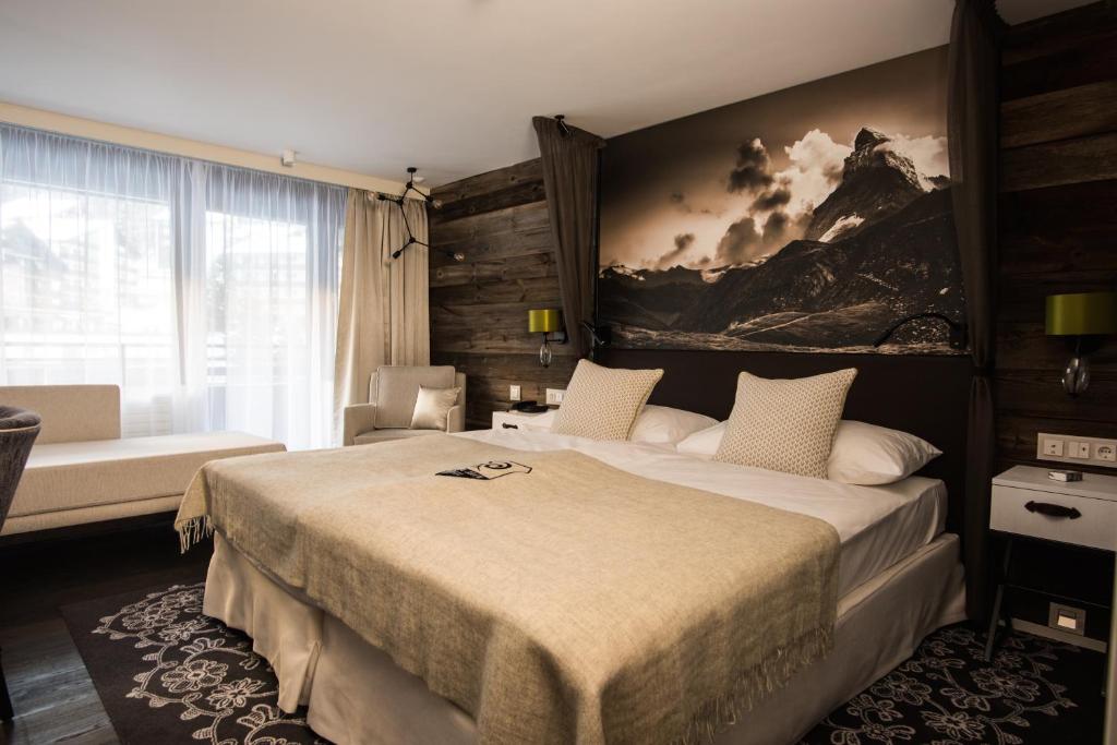 Двухместный (Двухместный номер Делюкс с 1 кроватью (для 2 взрослых)) отеля Wellness Hotel Alpenhof, Церматт