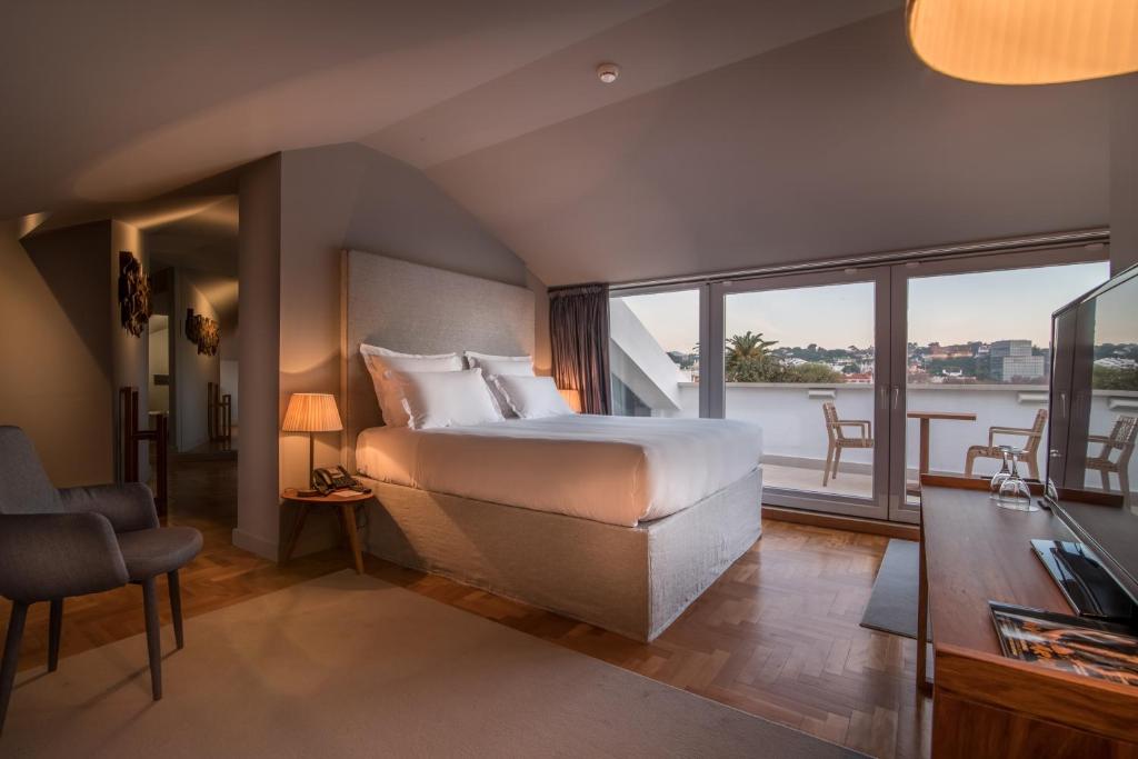 Двухместный (Двухместный номер «Гранд» Делюкс с 1 кроватью и террасой, с видом на море) гостевого дома Villa Cascais Guesthouse, Кашкайш