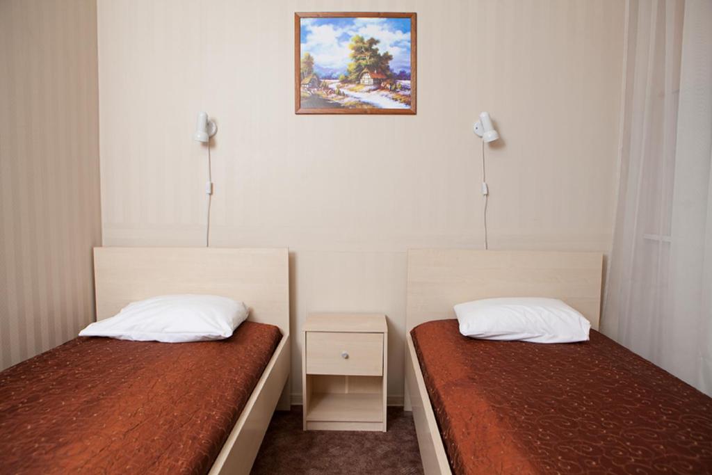 Номер (1 место в общем номере с 2 односпальными кроватями) хостела Eurohotel, Маарду