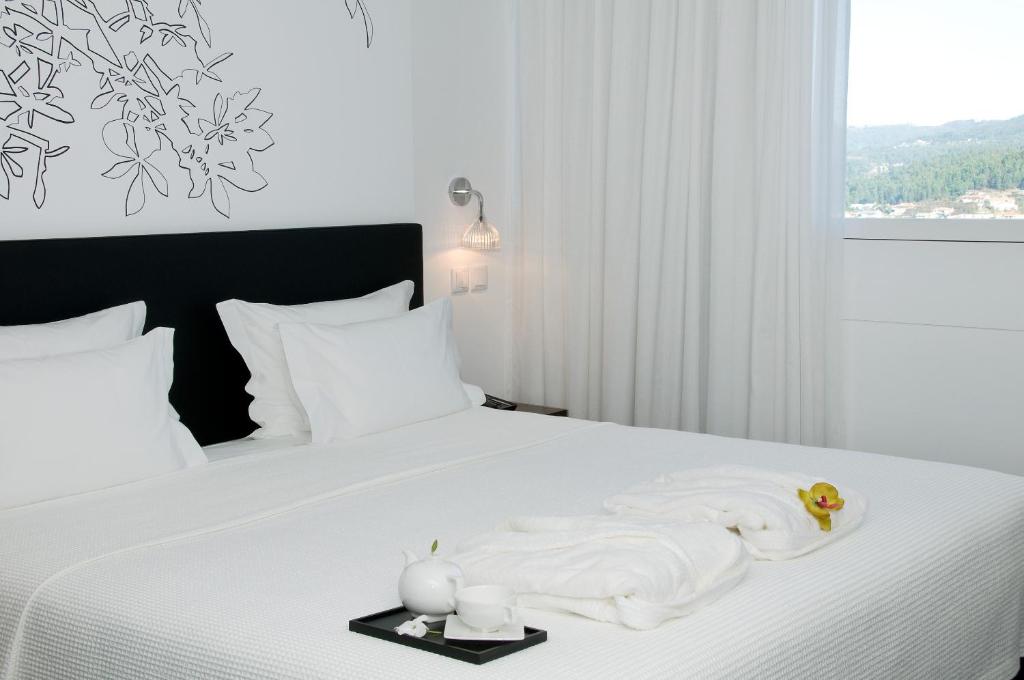 Двухместный (Двухместный номер с 1 кроватью или 2 отдельными кроватями) отеля Open Village Sports Hotel & Spa Club, Гимарайнш