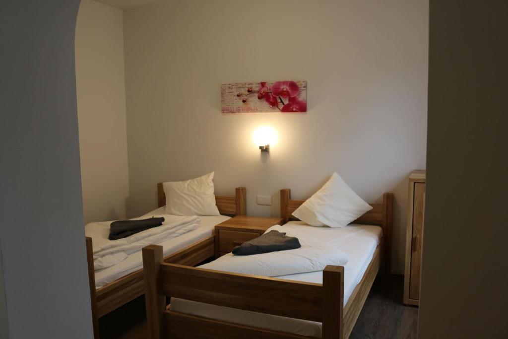 Двухместный (Бюджетный двухместный номер с 2 отдельными кроватями) отеля Lemon7, Клагенфурт-ам-Вёртерзе