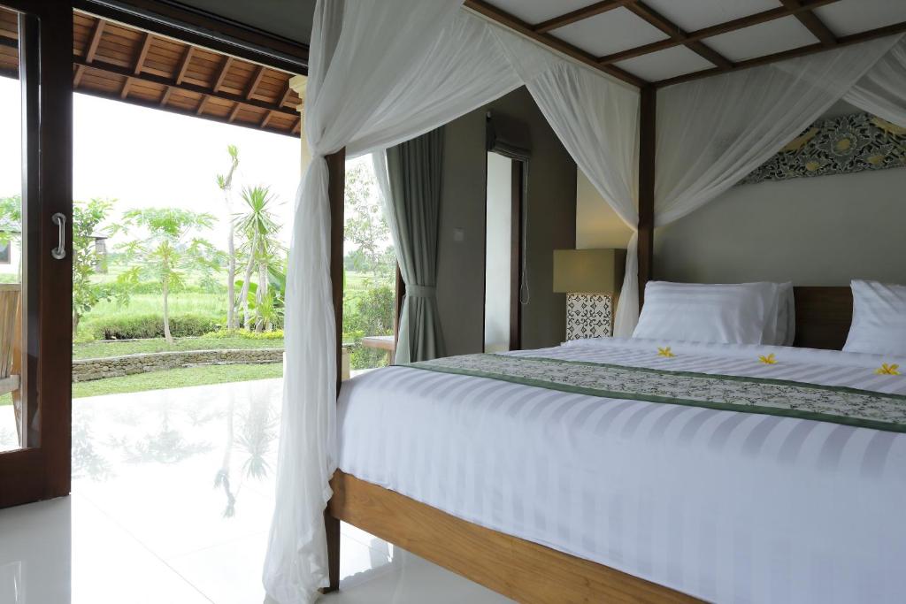 Двухместный (Двухместный номер с 1 кроватью или 2 отдельными кроватями) парк-отеля Masia Villa Ubud, Убуд