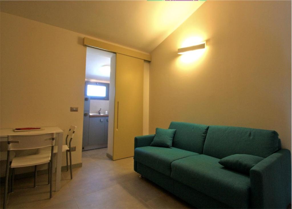 Апартаменты (Улучшенные апартаменты с 1 спальней (для 4 взрослых)) отеля Hotel & Residence Cavalluccio Marino, Римини