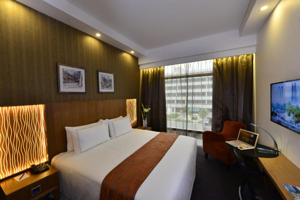 Двухместный (Представительский двухместный номер с 1 кроватью или 2 отдельными кроватями) отеля Hotel Grand Central, Сингапур (город)