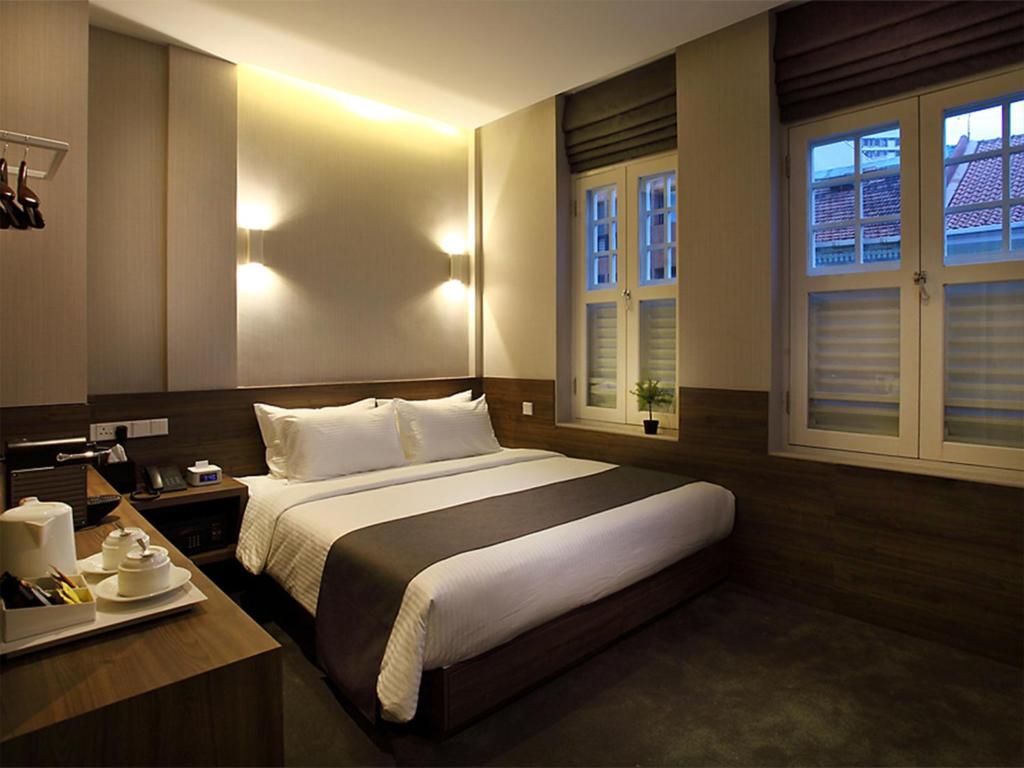 Двухместный (Двухместный номер Делюкс с 1 кроватью) отеля Arcadia Hotel, Сингапур (город)