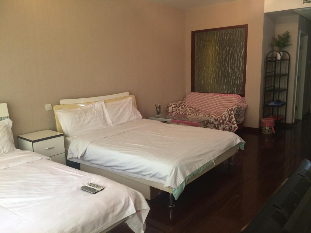 Двухместный (Двухместный номер Делюкс с 1 кроватью) апарт-отеля Beijing Huihui Home ApartHotel Chang'an Inn Branch, Пекин