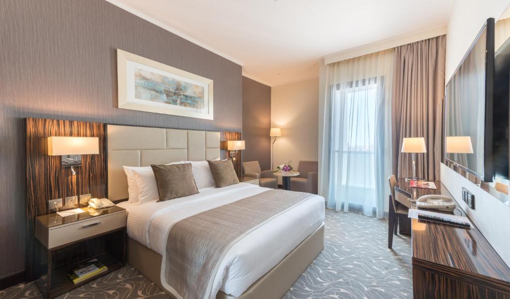 Двухместный (Номер Делюкс с 1 кроватью размера «queen-size») отеля Hawthorn Suites by Wyndham Abu Dhabi City Center, Абу-Даби