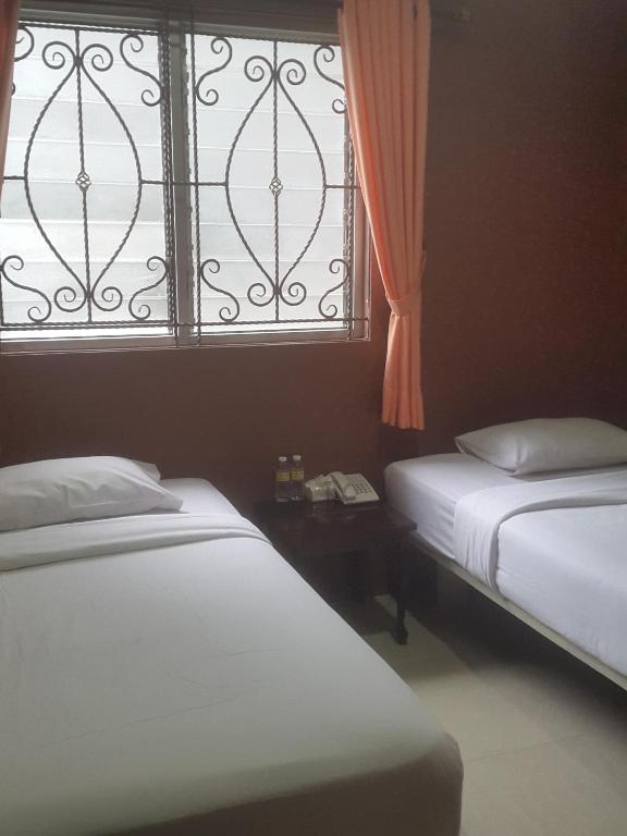Двухместный (Стандартный двухместный номер с 2 отдельными кроватями) отеля Twins Hotel, Джакарта
