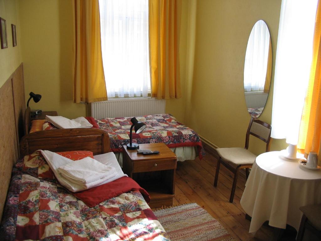 Двухместный (Двухместный номер с 2 отдельными кроватями и общей ванной комнатой) гостевого дома Kastani Home Accommodation, Тарту