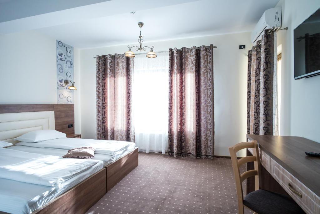 Двухместный (Двухместный номер с 1 кроватью или 2 отдельными кроватями) гостевого дома Pensiunea Royal Spa, Пьятра-Нямц