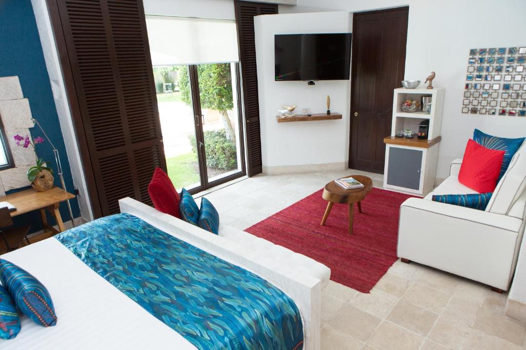 Двухместный (Люкс с кроватью размера «king-size») отеля Doña Urraca Hotel & Spa, Керетаро