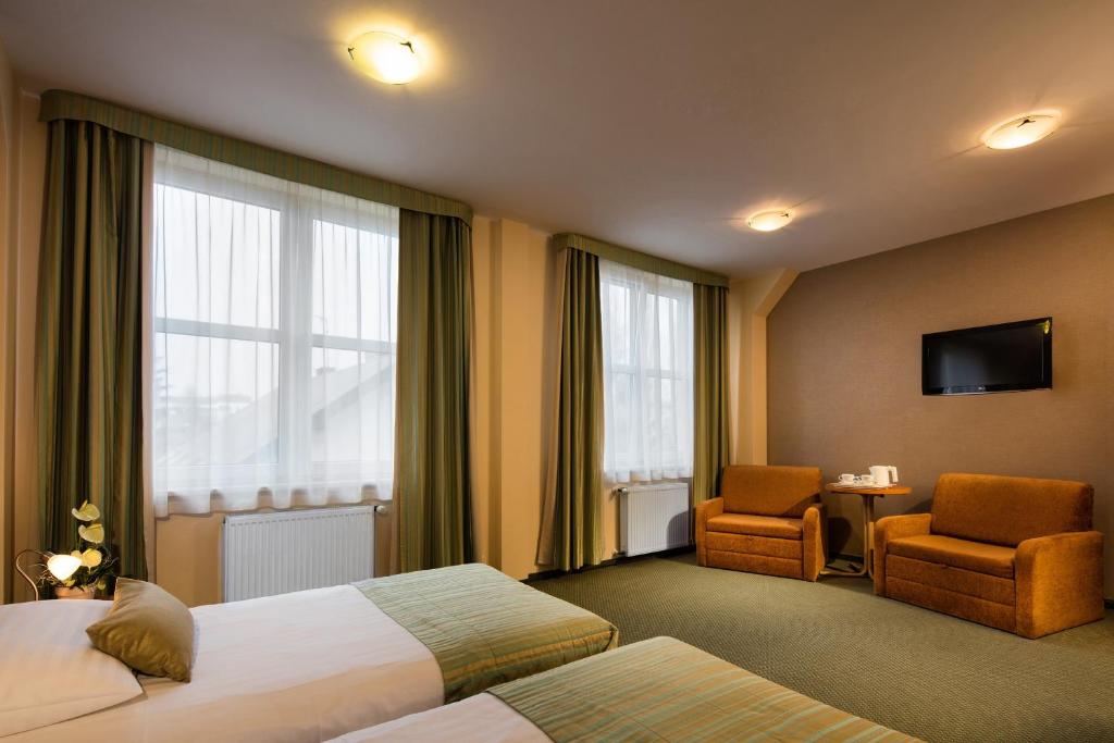 Двухместный (Улучшенный двухместный номер с 2 отдельными кроватями) отеля Best Western Hotel Galicya, Краков